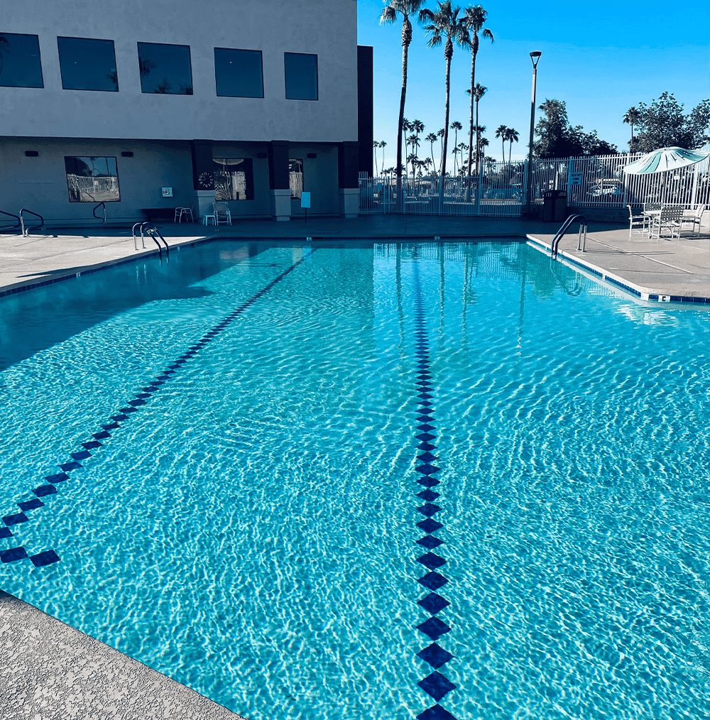 Large, clean commercial swimming pool maintained by Good Life Pool & Spa Care